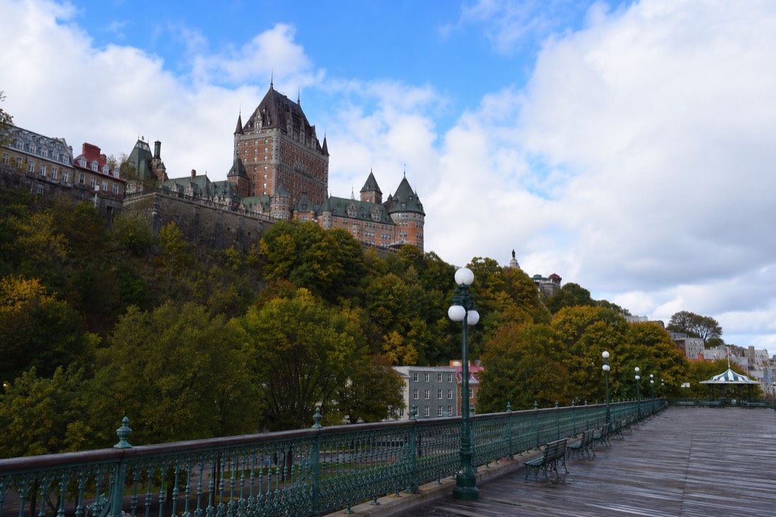 Dufferin Terrace boardwalk with the Château Frontenac towering above visitors at the railing