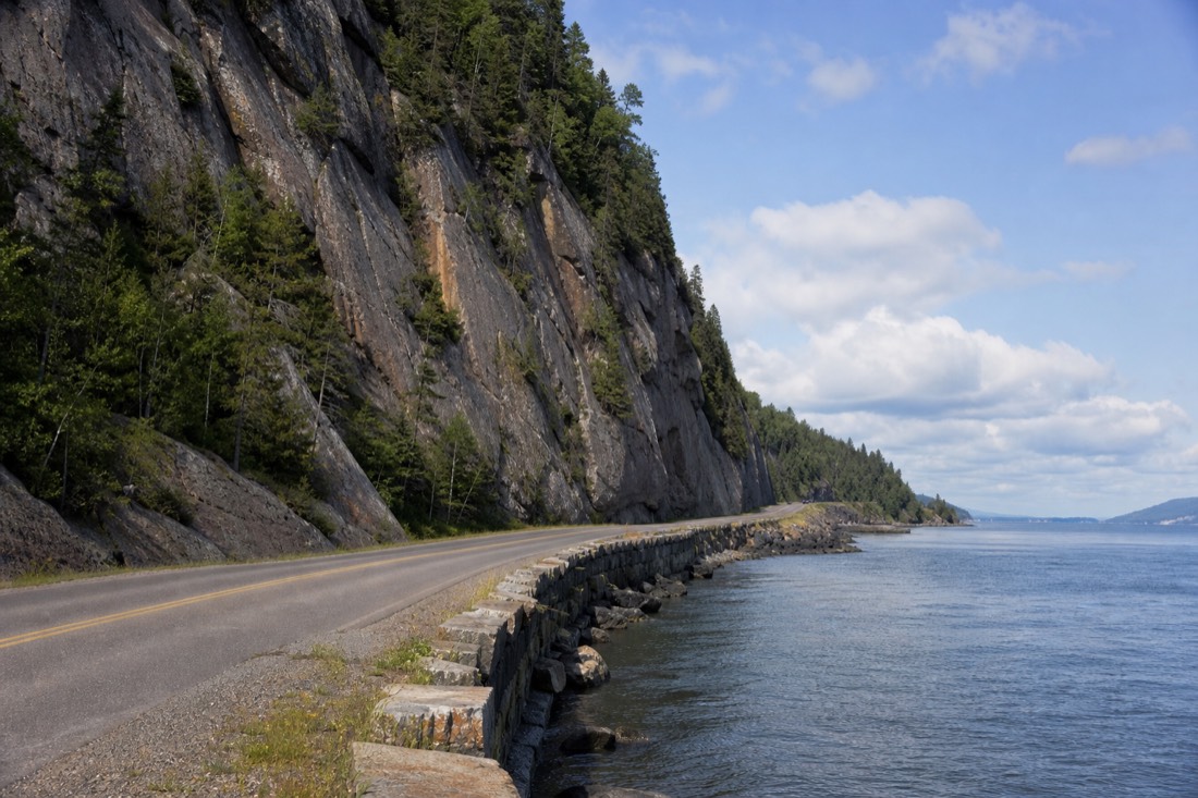 Road along the Beaupré coast east of Quebec City with the St. Lawrence River beside it